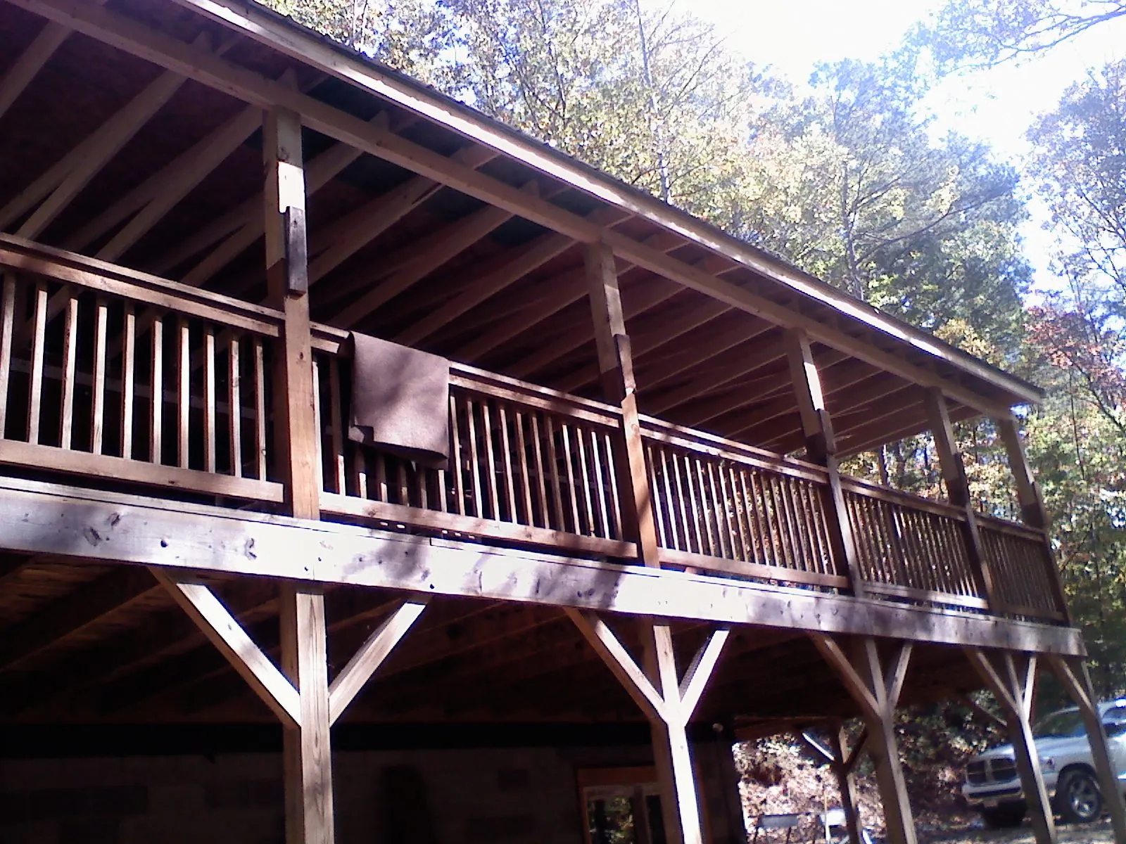 Timber framing under a new elevated porch and deck — Roof Leak Repair in South Park by Roofing Brothers